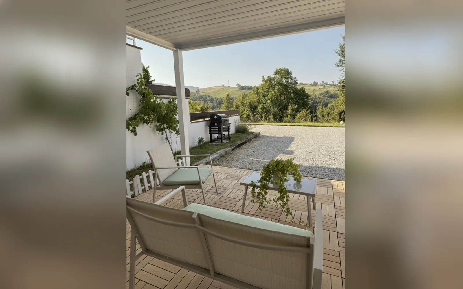 The outdoor seating area on the holiday home's wooden patio
